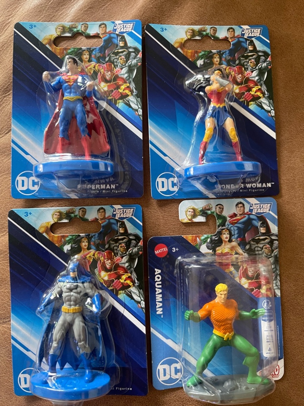 DC set features Superman, Wonder Woman, Batman, and Aquaman; Cake Topper